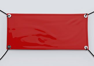 Red event banner with grommet holes